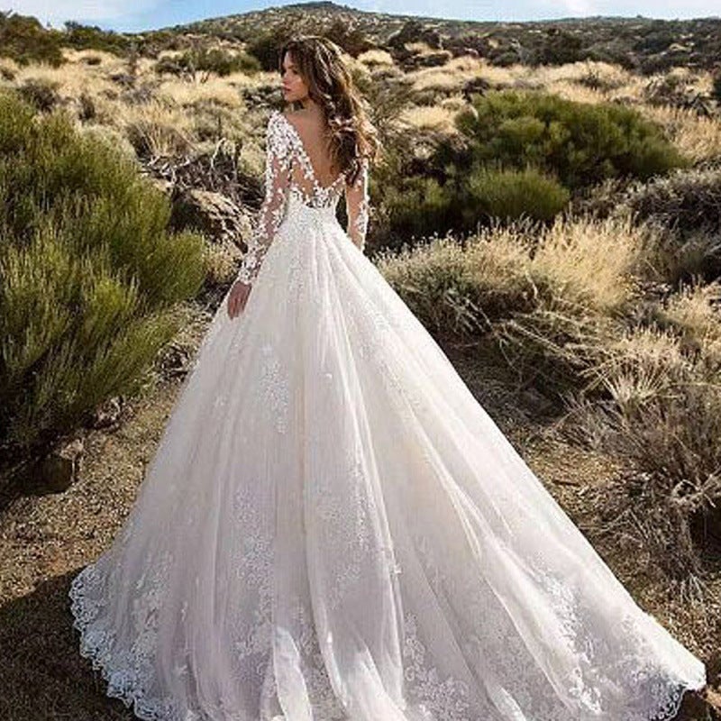 فستان زفاف نسائي بأكمام طويلة بلون موحد مع دانتيل شفاف - Image 4